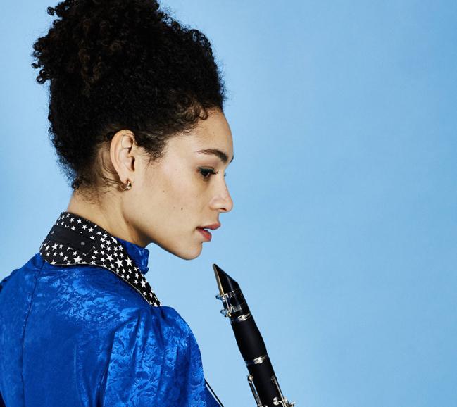 girl with starry night neck strap and clarinet